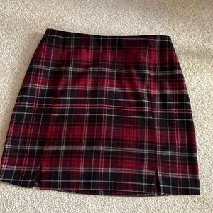 Eyeshadow red black and white plaid skirt with leg slits and back zipper.